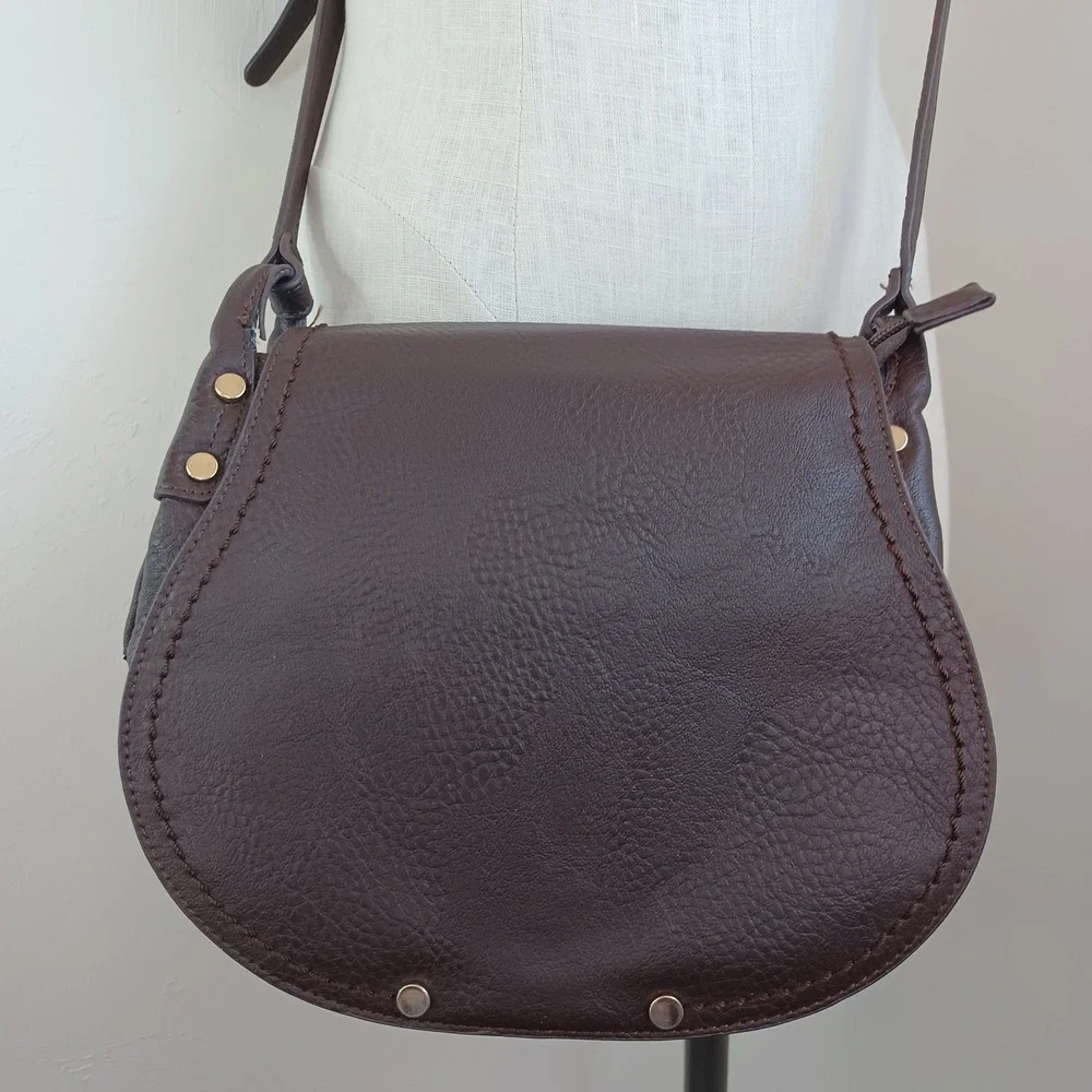 Charming Charlie Brown Pebbled Vegan Leather Saddle Crossbody Bag Whipstitch